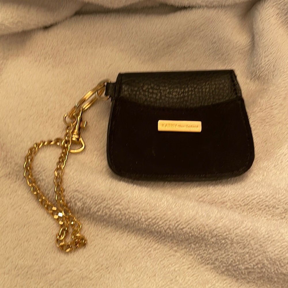 Kathy von Le Leland wrislett black coin holder with metal gold leach